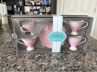 Small Tea Cups and Saucers never opened