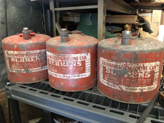 3 Old Behren’s 5 gallon gas cans