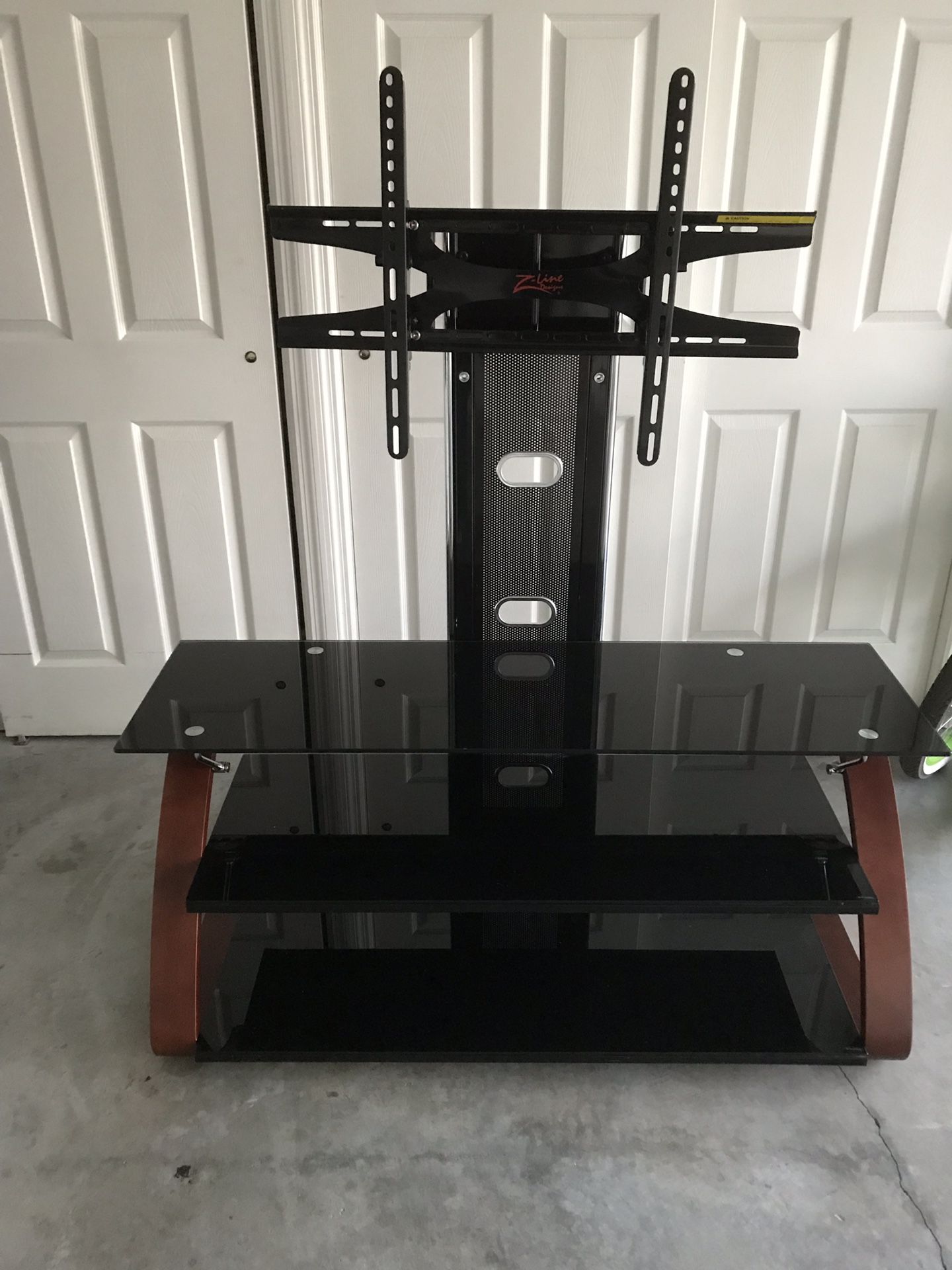 Z line brand TV stand. Holds up to 60” TV. In great condition.