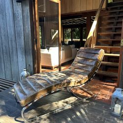 Distressed Leather Chaise — Solid Build, Heavy Metal Frame