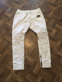 All white Subvers jogger pants