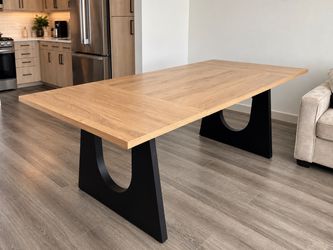 Modern Oak Dining Table with Black Sculptural Legs