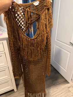 Lovers and Friends crochet swimsuit cover-up, skirt, and top