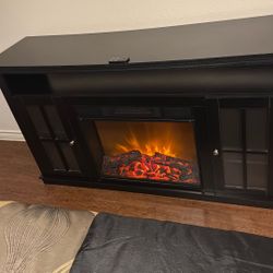Salen My All Black Expensive Wood Fire Place With Different Settings 