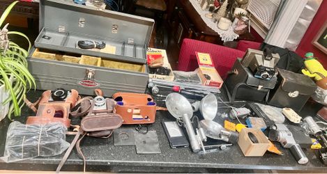 vintage box with vintage cameras and equipment