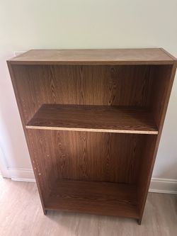 2 wooden bookshelves