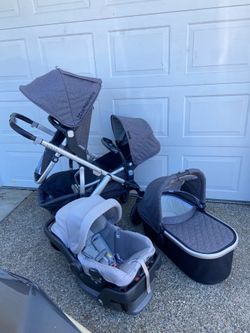 Uppababy Vista Double Stroller with bassinet and car seat
