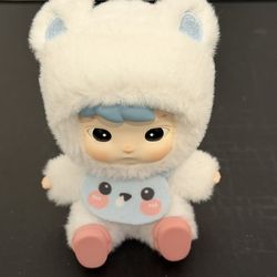 The figure seem to say, Hug me and Take me home, mommy!