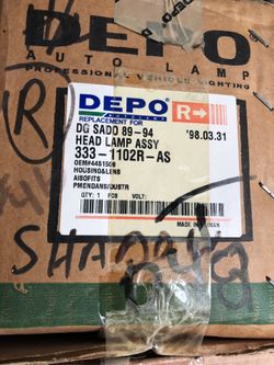 89-94 dodge shadow head light