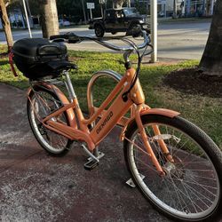 Pretty Pink Electric Bike In South Beach