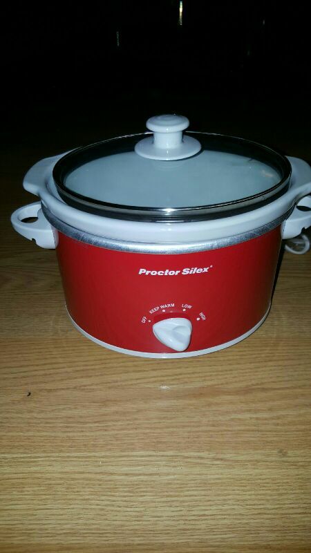 Utensils red little crock pot....Brand new!..never used