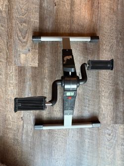 Under desk bike pedal exercise