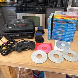 Sega CD Model 1 w/ Genesis. Pristine Condition 21 games