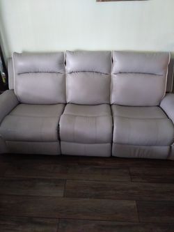 2 Grey Reclinable Vinyl Couches