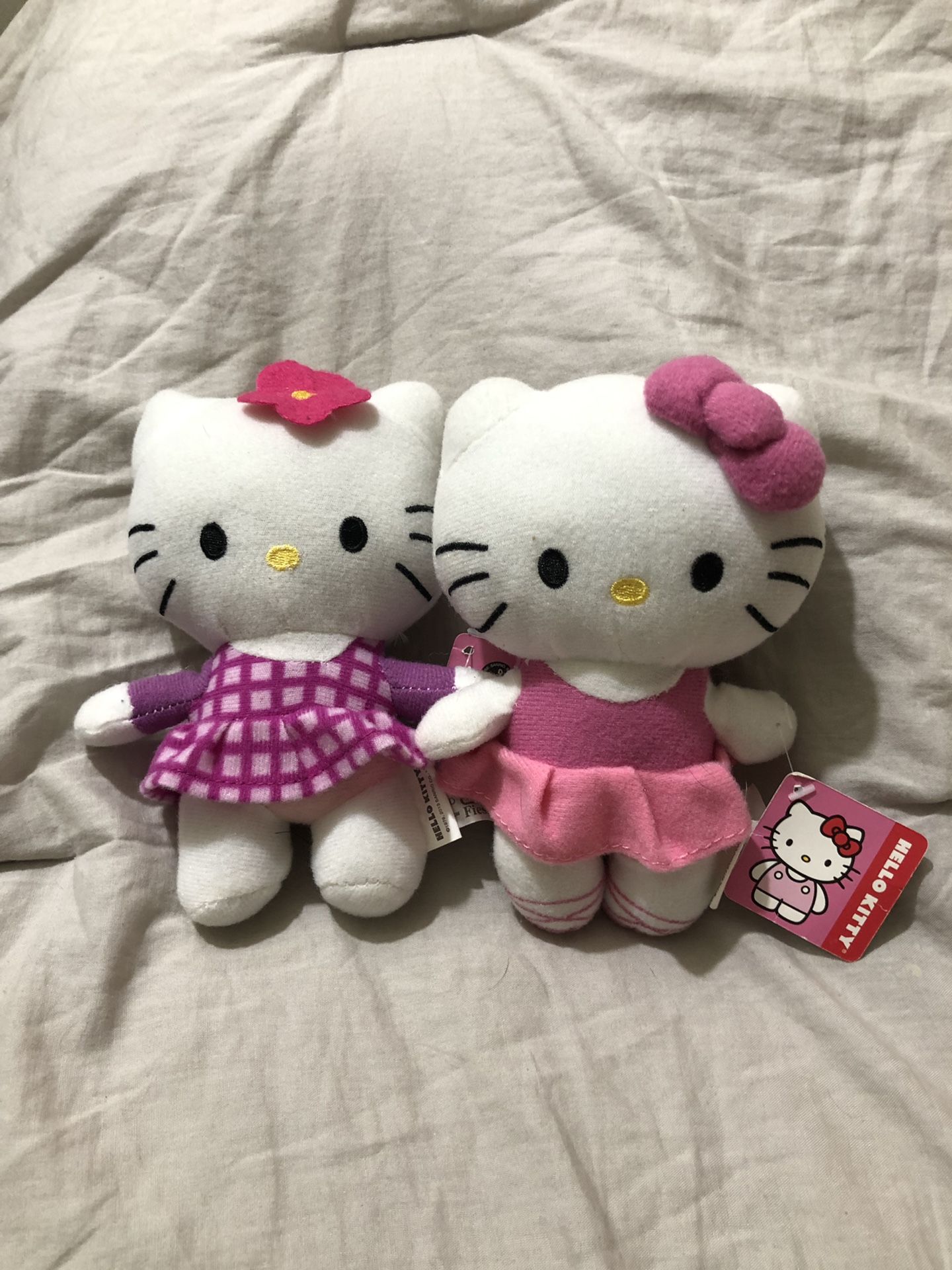 2 mini hello kitty plushies