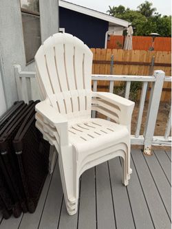 3 outdoor chairs with cup holders