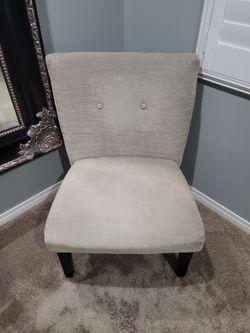 Padded armless accent chair