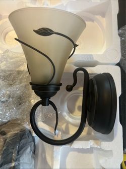 NIB 2 indoor wall bronze finish, metal vine and leaf motif,frosted, glass shade.