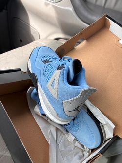 Air Jordan 4 University Blue Sneakers