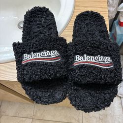 Black fur slides size 9