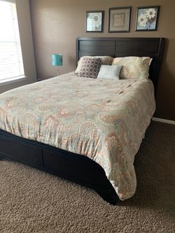 Queen bed frame ,dresser, mirror and a nightstand
