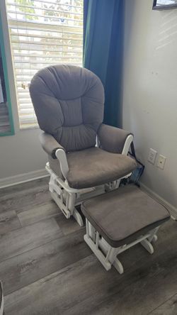 Nursery Rocking Chair eith ottoman.