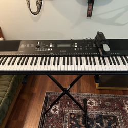 Psr ew300 price deals