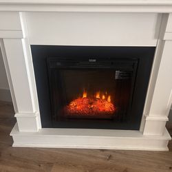 Freestanding electric fireplace