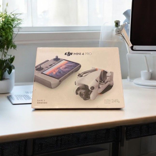 6558798 DJI mini 4 pro drone and RC 2 built in screen Floor Model