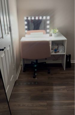 Vanity with mirror and xl swivel pink chair