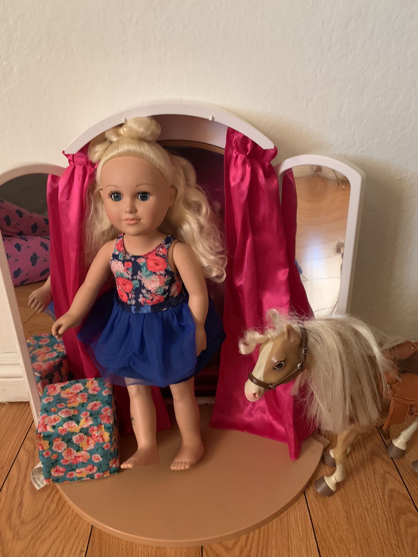 Doll, mirrow, horse and a sofa