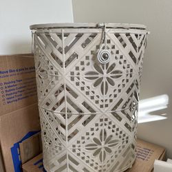 White metal laundry hamper