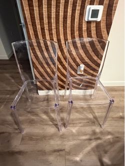 2 acrylic chairs.. used .. $80
