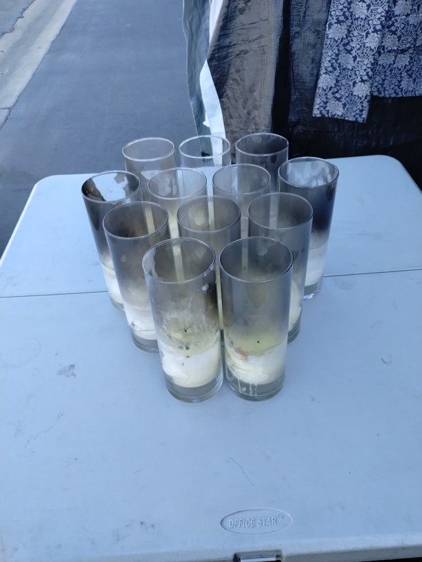 Set Of 12 - 9" Cylinder Vases. Used with Candles. Needs To Be Cleaned