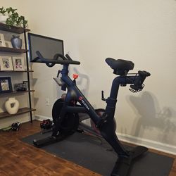 Peloton Bike With Weights And Mat
