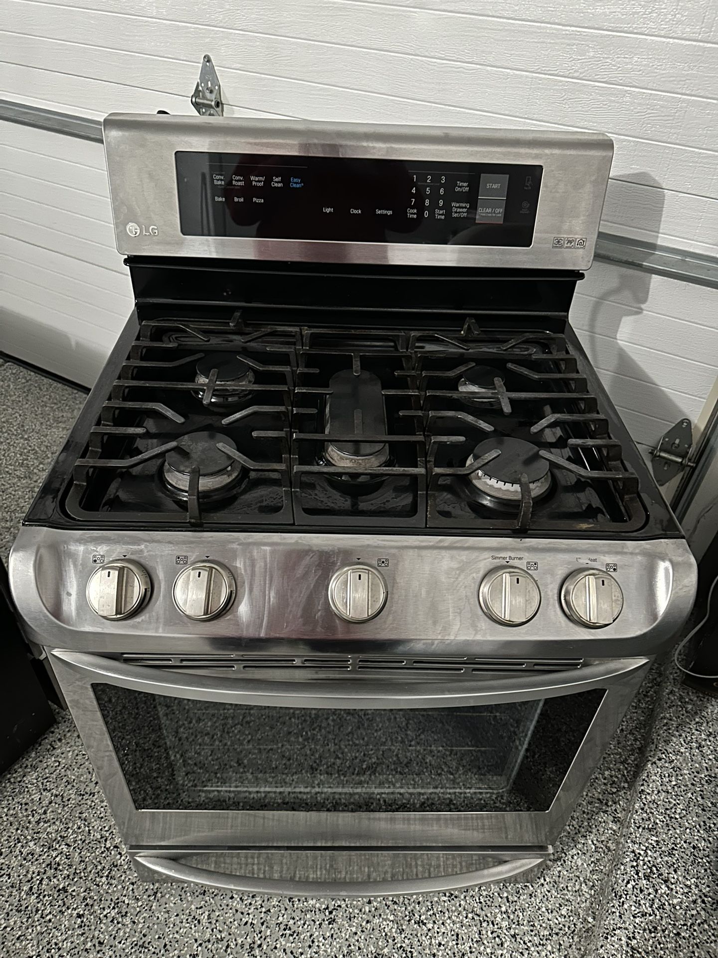 Stainless steel 5 burner convectional, air fryer gas stove & over the range microwave (LG)