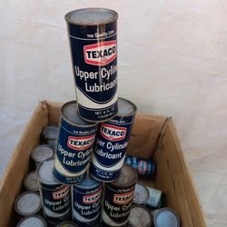 Texaco 4 oz collectible cans.