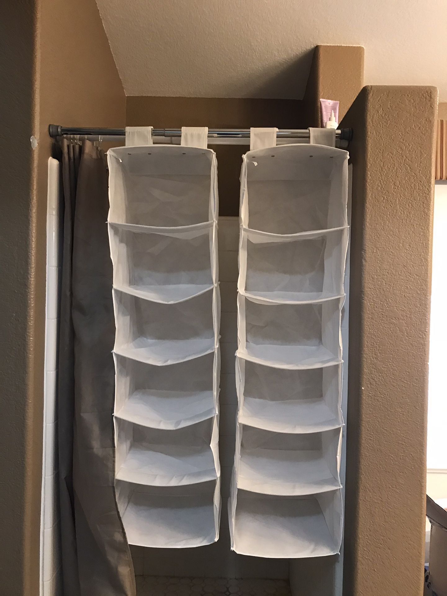 Hanging closet organizer shelves