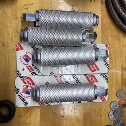 Knurled, aluminum foot pegs polished
