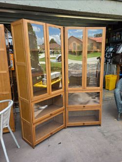Set of 2 wooden Cabinets with Acrylic doors
67"T x 25"W x 12.5"D 2 available price is for each $235