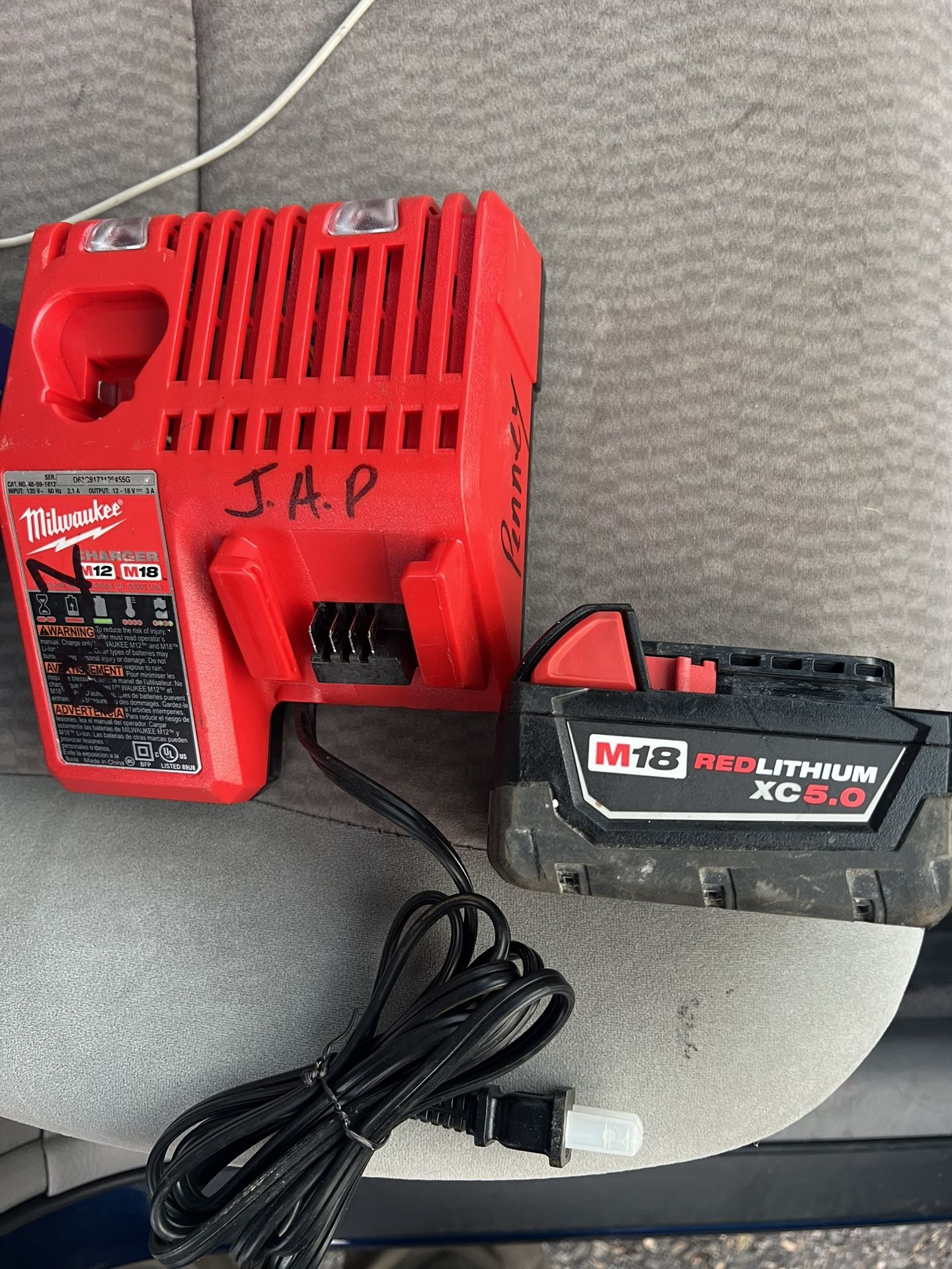 Milwaukee M18 RED Lithium XC5.0 Battery And Charger 