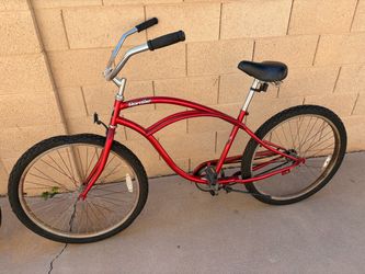 His and hers old Beach cruisers