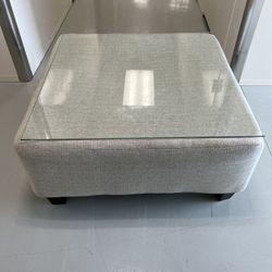 Ashley Ottoman With Glass 