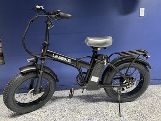 UNIBIKE 28mph, 48v 15.ah Removable Battery , 20 Inch Fat Tires  