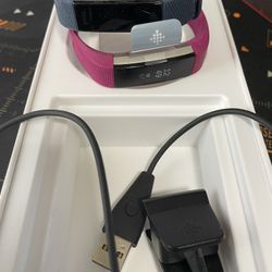 Two Fitbit Alta HR
