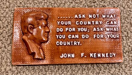 Vintage plaster wall hanging with quote by President John F. Kennedy