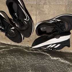 2 Pairs Of Tennis Shoes One Is Like New Size 10.   15. For  Both 