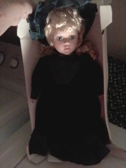 Brand New Porcelain Doll In Box ..