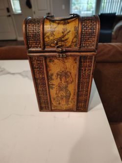 Antique wicker wine bottle holder