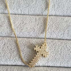 Gold Cross Pendant With Cubic Zirconia...19 Inches Long Chain. 